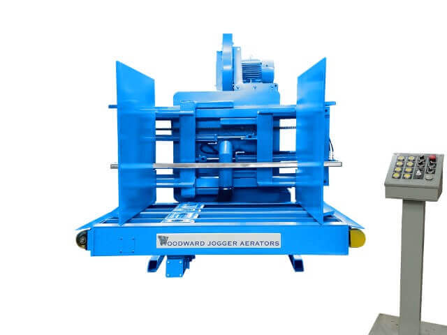 Light blue FL Series machine for efficient pile turning and jogging, only available at Woodward invented the Pile Turner and Jogger Aerator over 63 years ago, and has over 5,000.