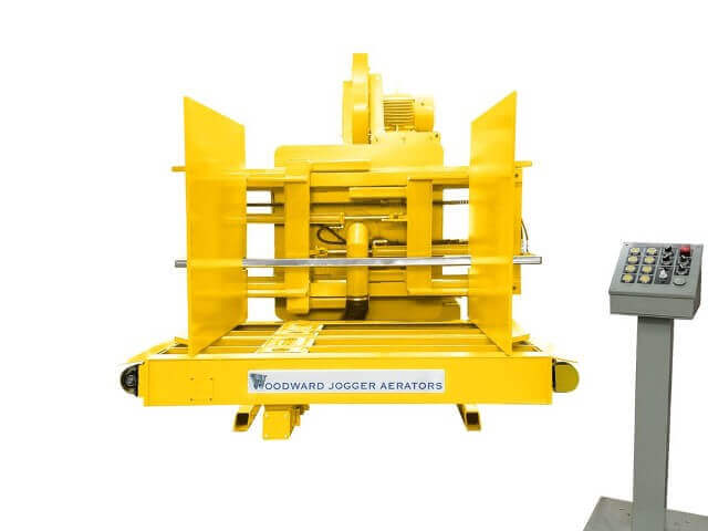 Yellow FL Series Jogger Aerator machine, expertly crafted by Woodward invented the Pile Turner and Jogger Aerator over 63 years ago, and has over 5,000.